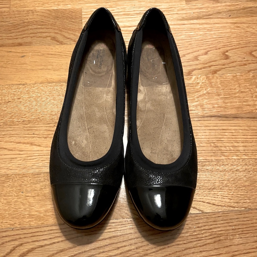 Clarks black ballet flats.